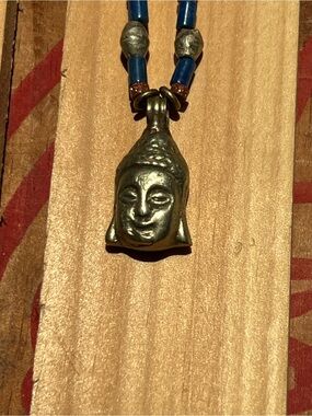 Buddha Pendant Necklace with Blue 
And copper color beads